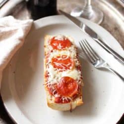 french bread pizza on a plate | one dish kitchen