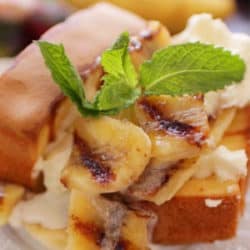 grilled pound cake topped with bananas and cream.