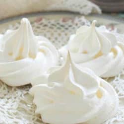 three meringue swirls on a plate
