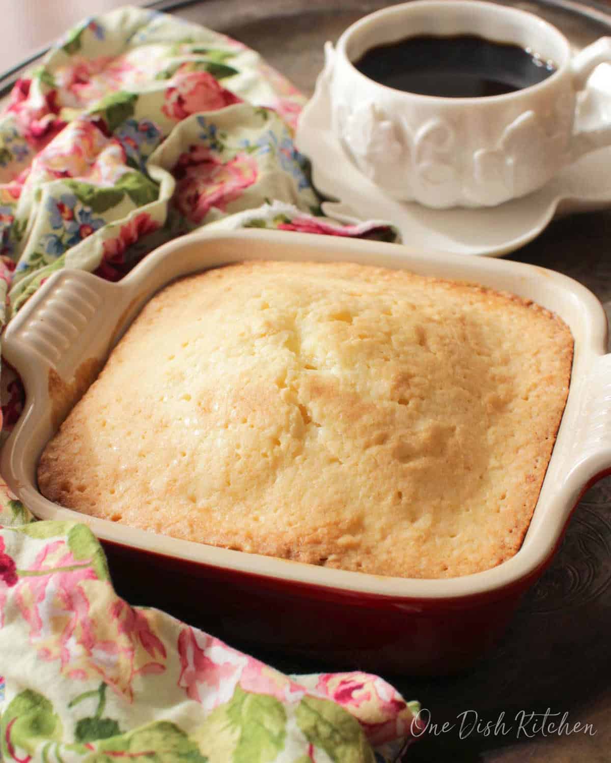 a small pound cake in a square baking dish.