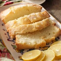 slices of a small pound cake on a white plate.