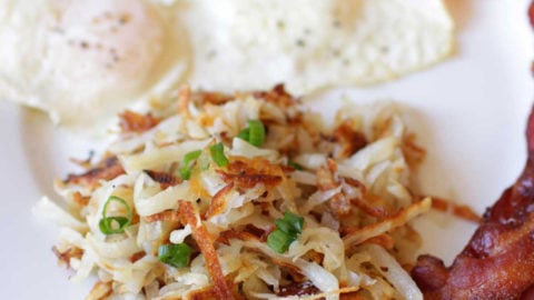 OC] The first shredded hash brown I have ever made. Two potatoes shredded  in a cheese grater, seasoned with garlic salt, cooked in the skillet and  then placed in the toaster oven