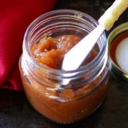 a small batch of homemade apple butter in a jar.