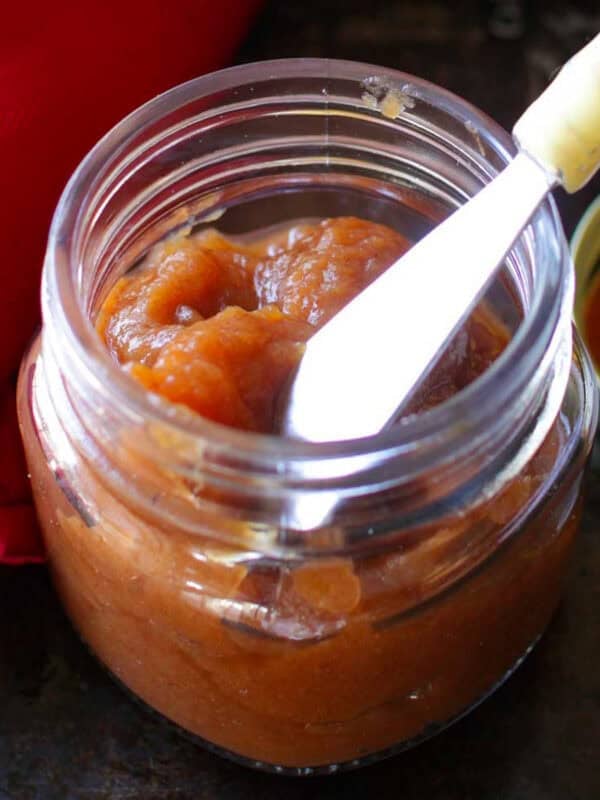 a small batch of homemade apple butter in a jar.