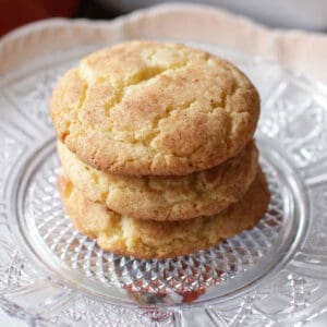 snickerdoodle cookies on a glass plate.
