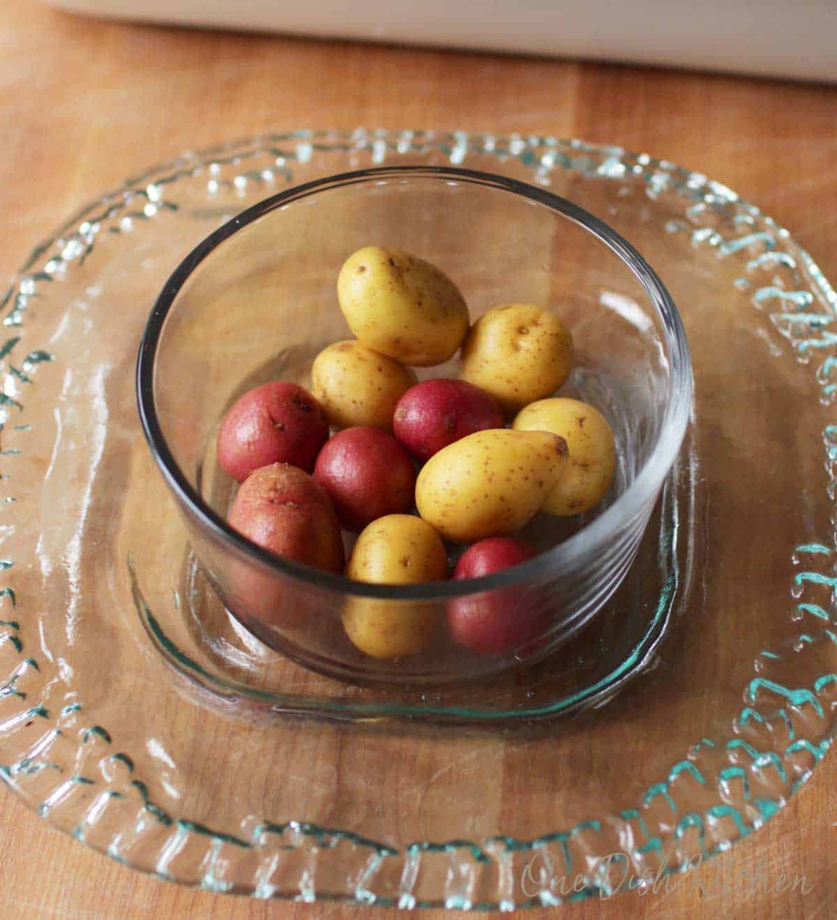 A small bowl of baby potatoes 