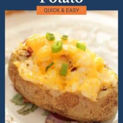 a twice baked potato on a white plate.