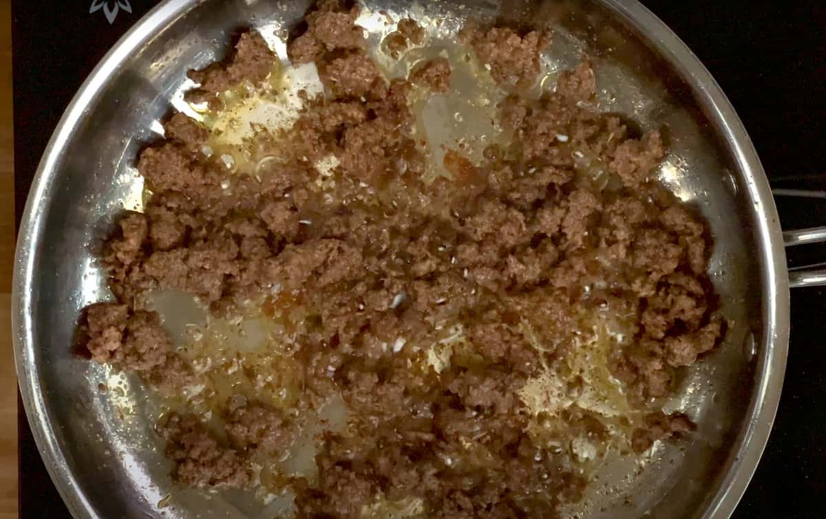 taco meat browning in a skillet
