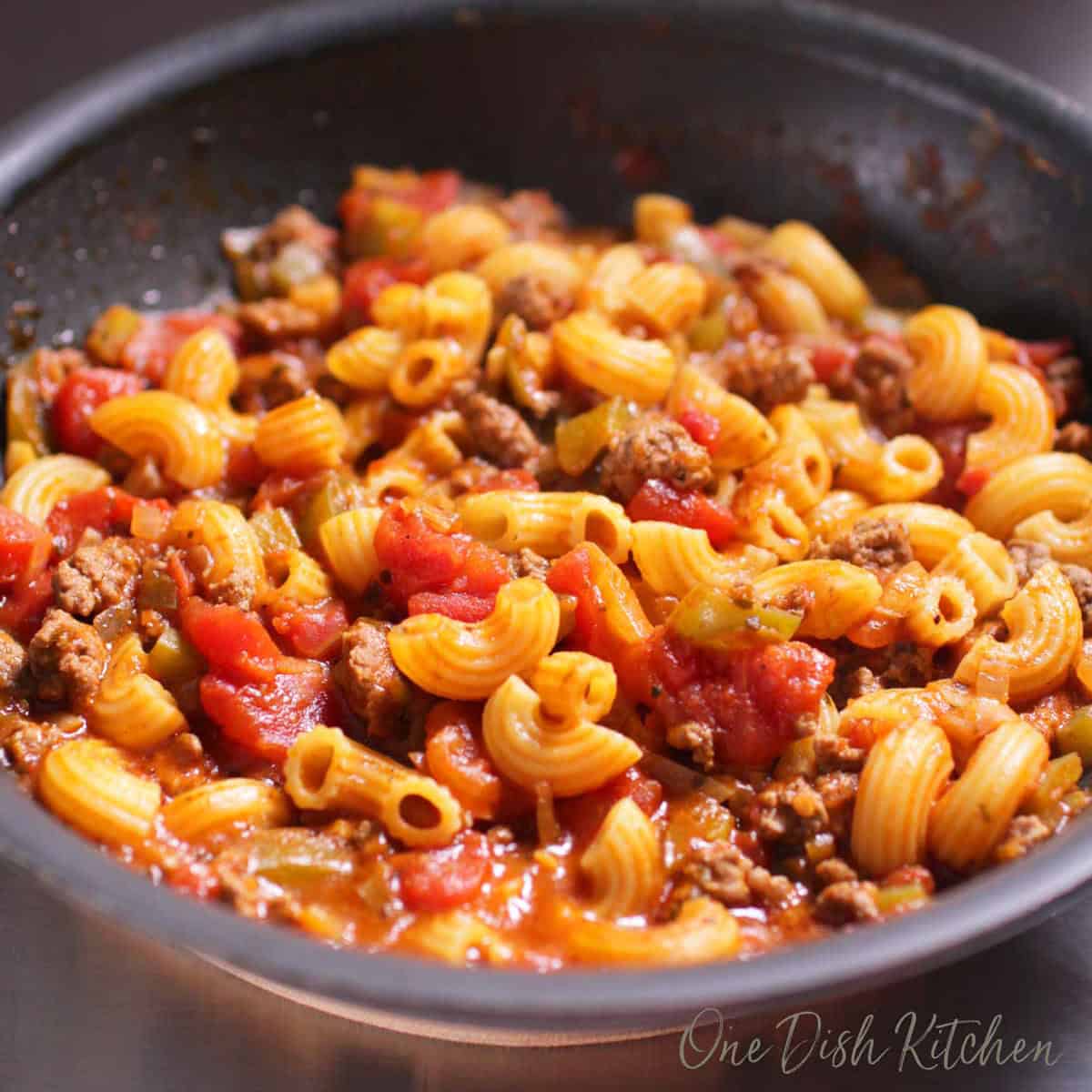 american goulash simmering in a skillet.