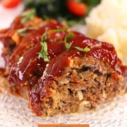 a small meatloaf on a white plate.