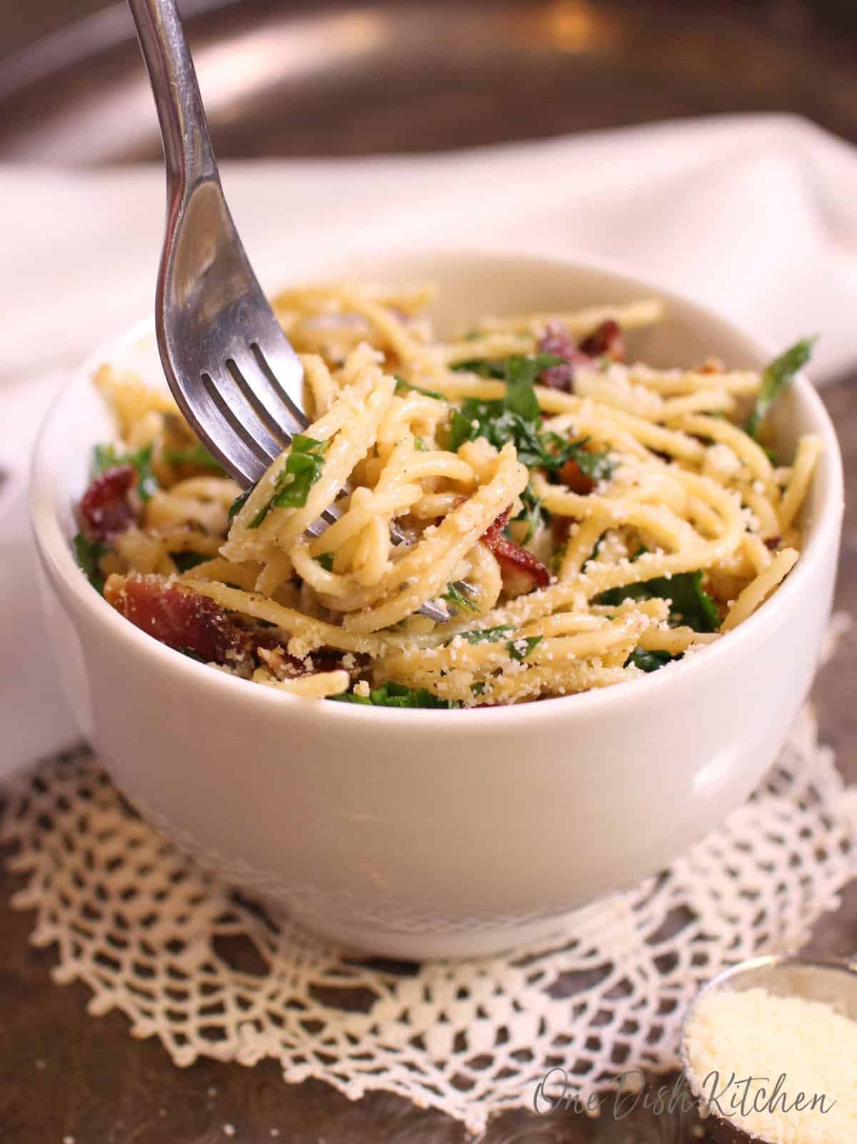 a bowl of pasta carbonara.