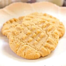 a small batch of chewy peanut butter cookies on a plate.