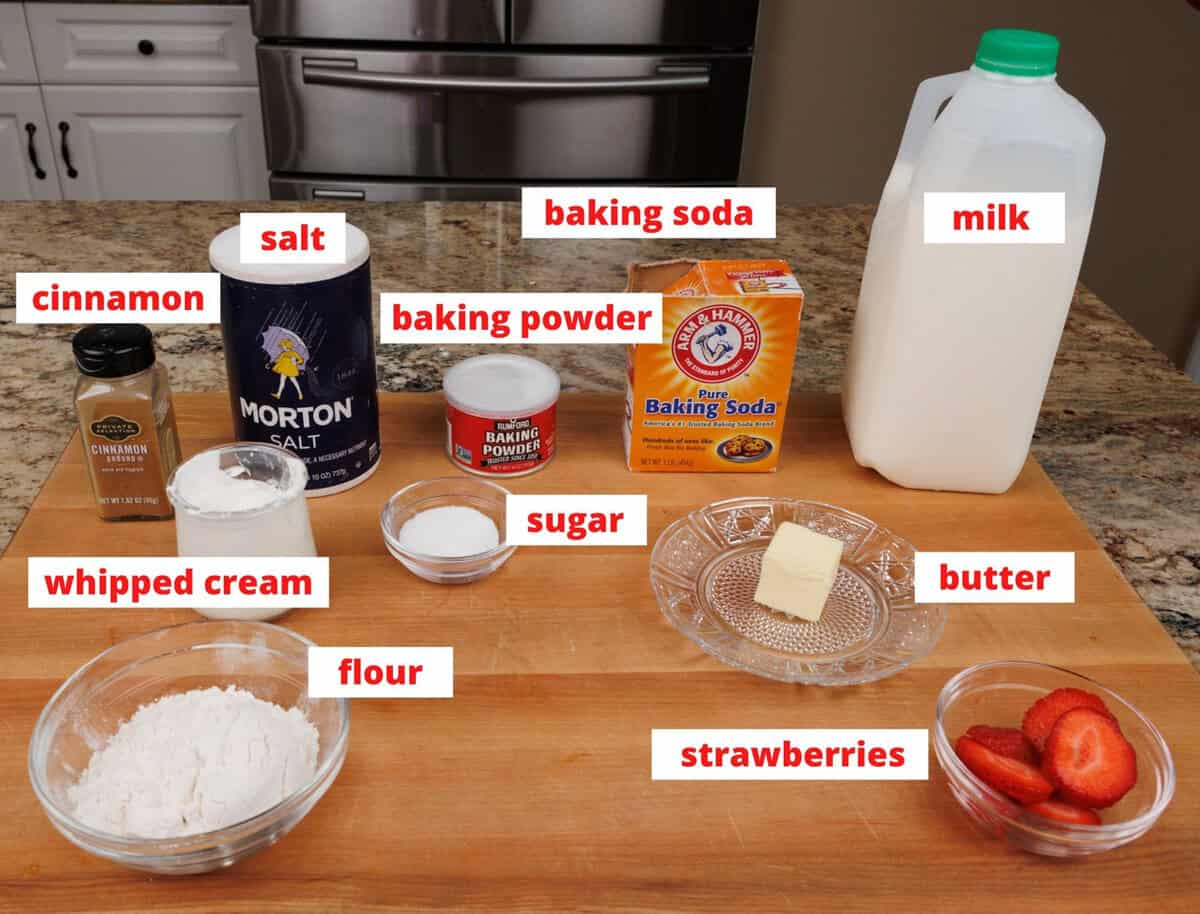 strawberry shortcake ingredients on a kitchen counter.
