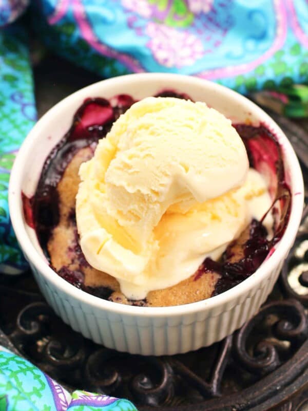 a small blueberry cobbler topped with ice cream