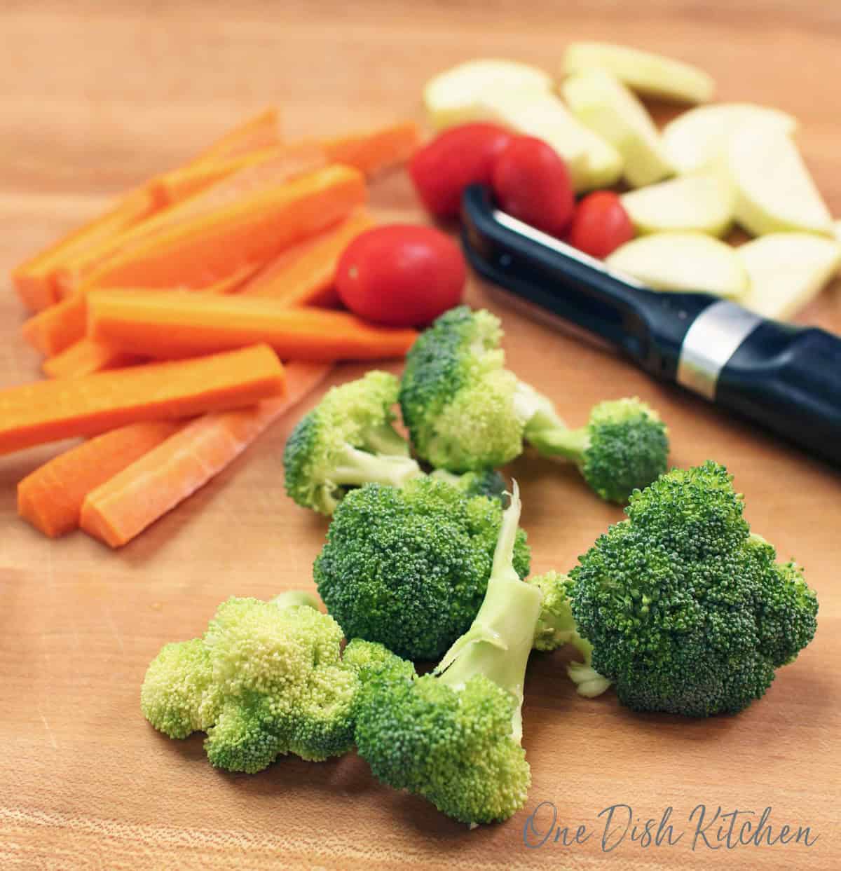 raw vegetables on a cutting board.
