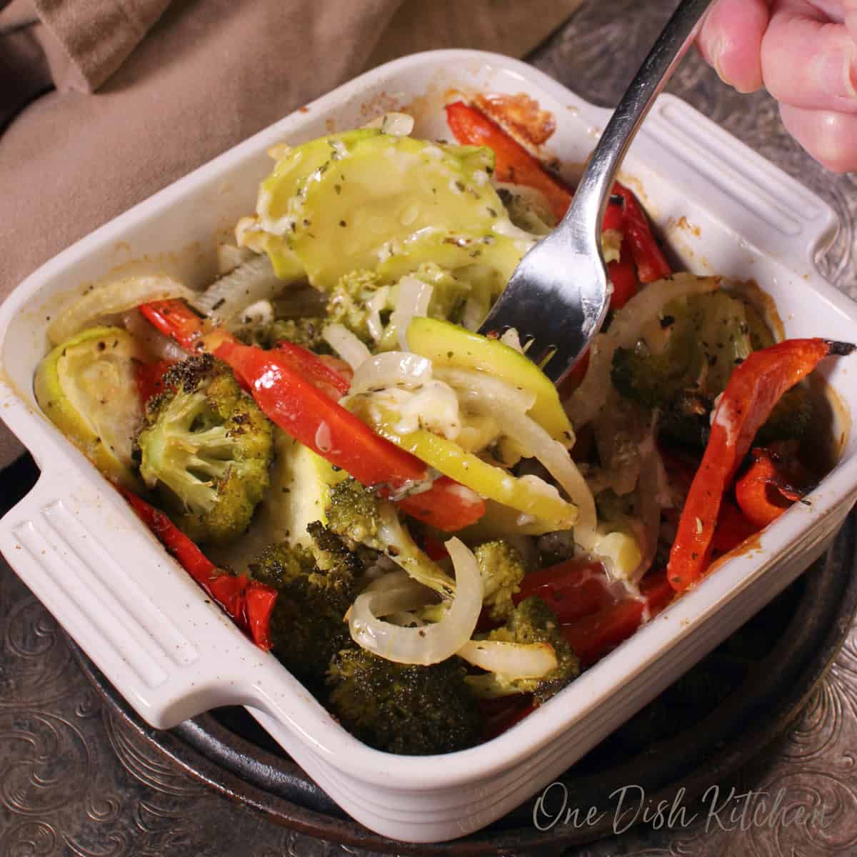 a cheesy baked vegetable casserole for one person.