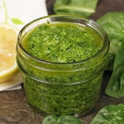 a small batch of spinach pesto in a jar.