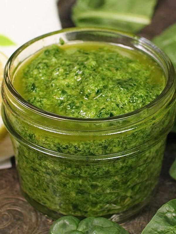 a small batch of spinach pesto in a jar.