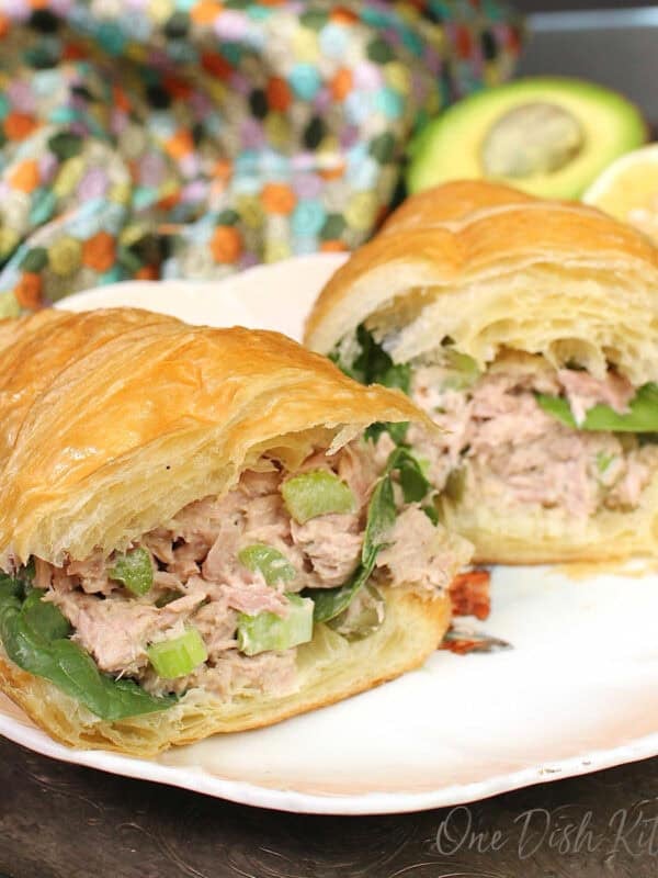 a tuna salad sandwich made with a croissant.
