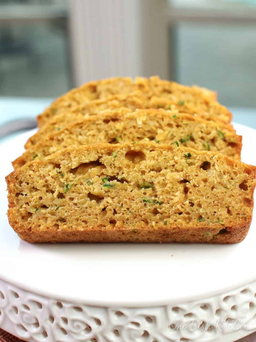 slices of zucchini bread on a white plate.