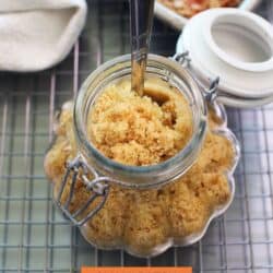 a jar of brown sugar on a kitchen counter.