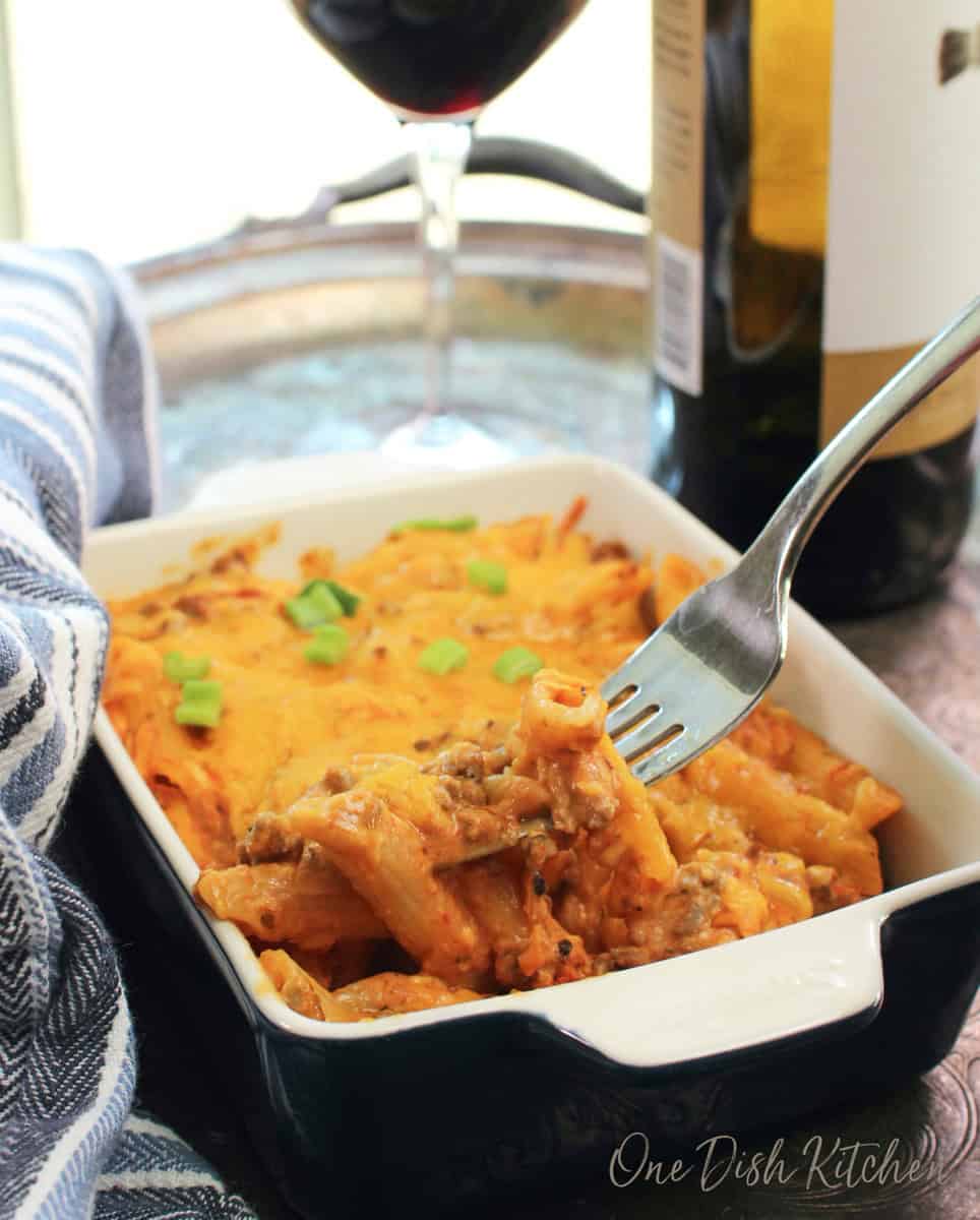 a small hamburger casserole with a fork on the side.