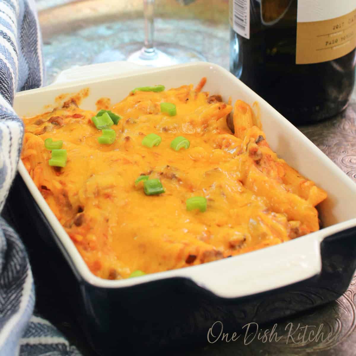 a small hamburger casserole topped with melted cheese.