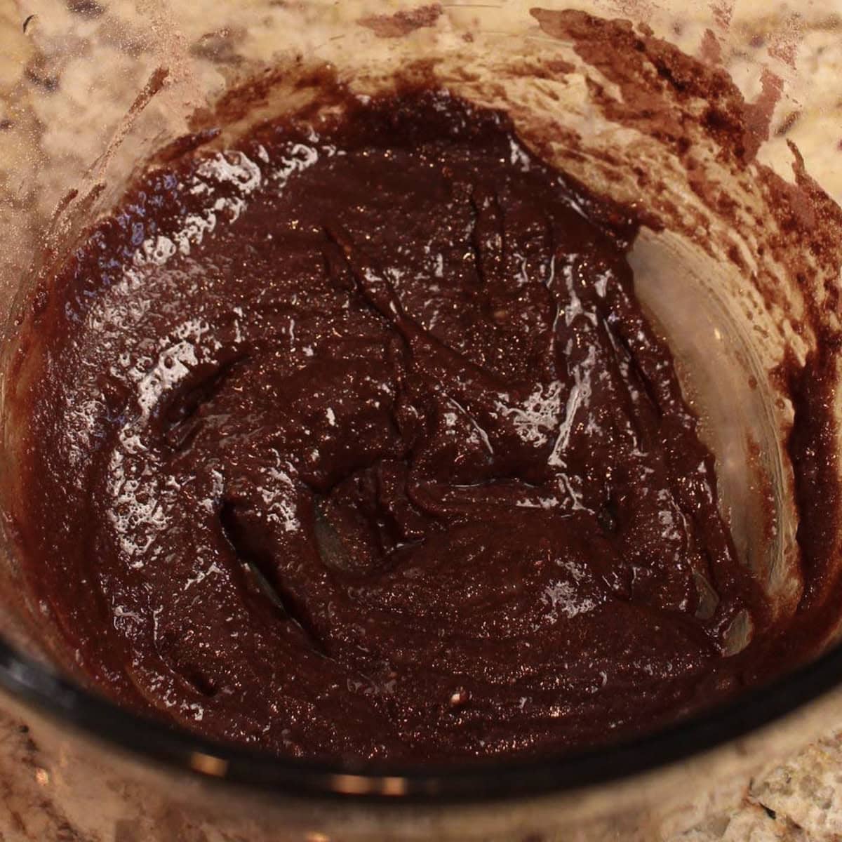 brownie batter in a mixing bowl.