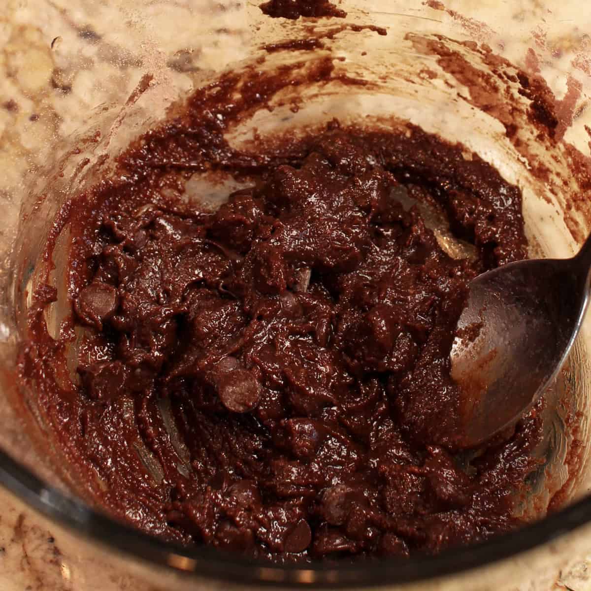 a small batch of brownie batter with chocolate chips.