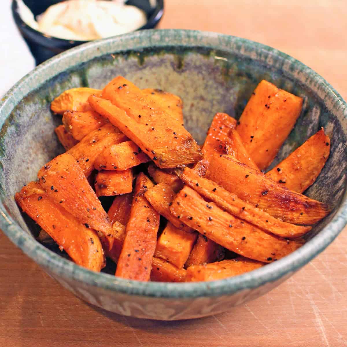 a small bowl of baked sweet potato fries.