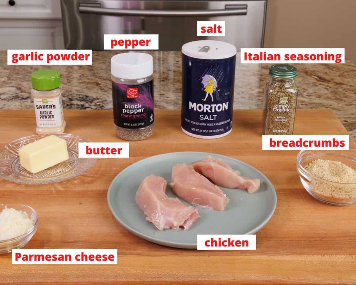 chicken tenders ingredients on a wooden cutting board in a kitchen