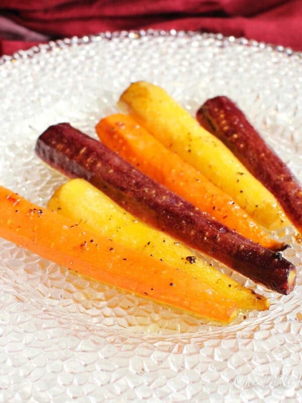 a single serving of citrus glazed carrots on a plate.