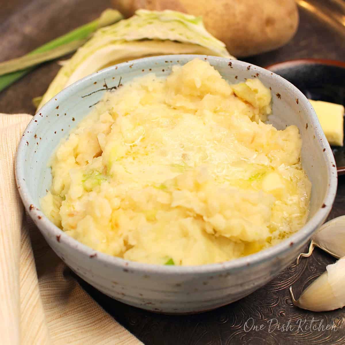 a single serving of colcannon with potatoes and cabbage.