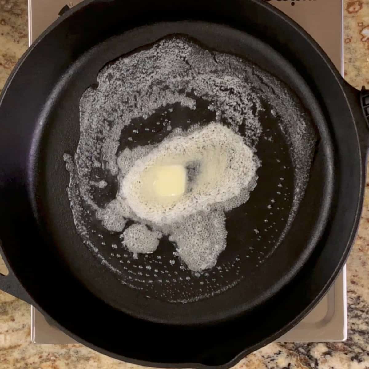 butter melting in a skillet.