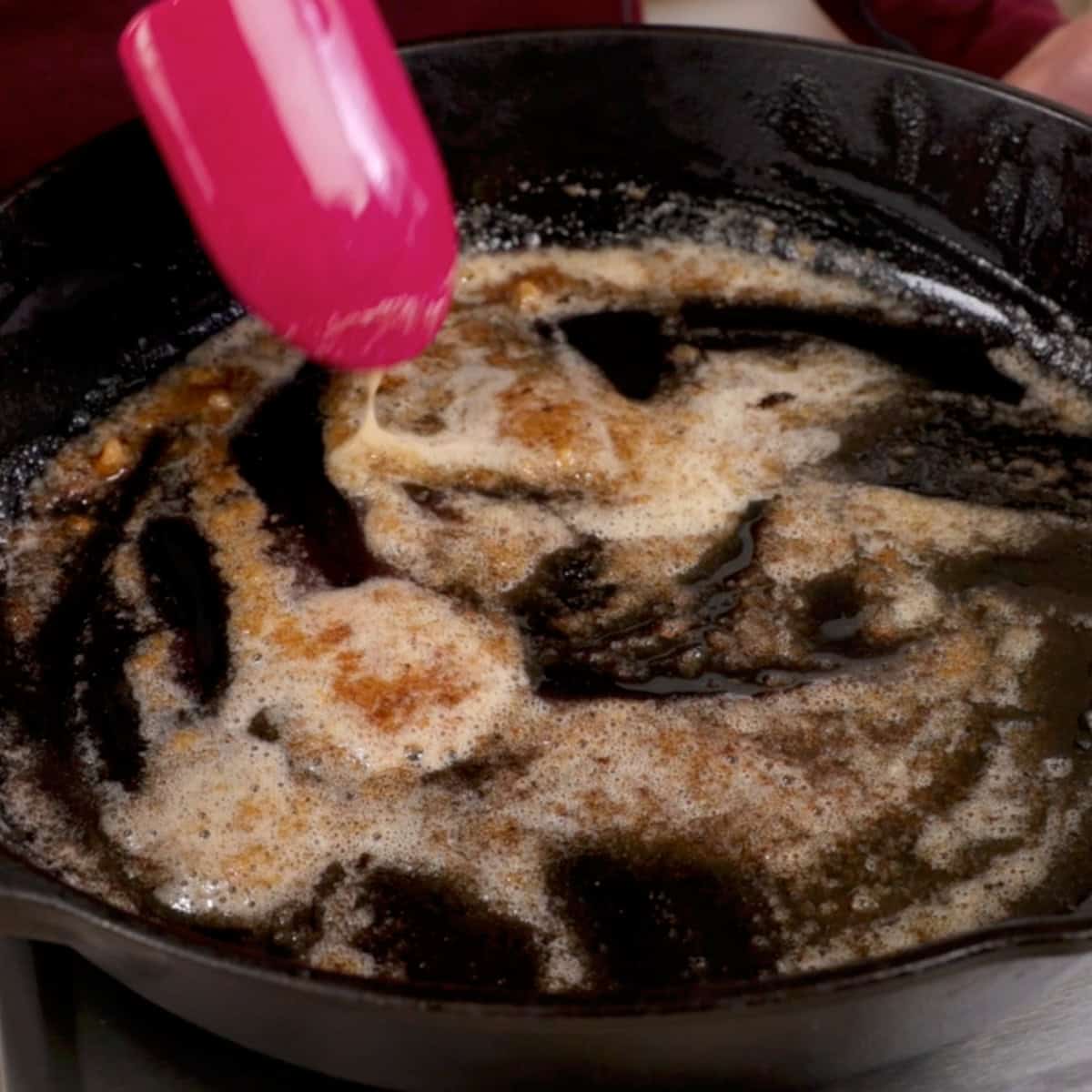 brown sugar melting in butter in a skillet.