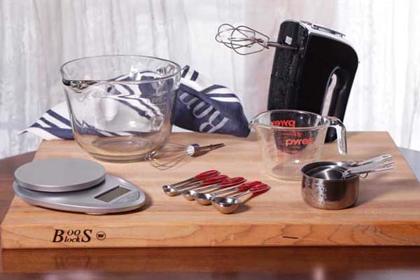 mixer, measuring cup, food weight scale and measuring spoons