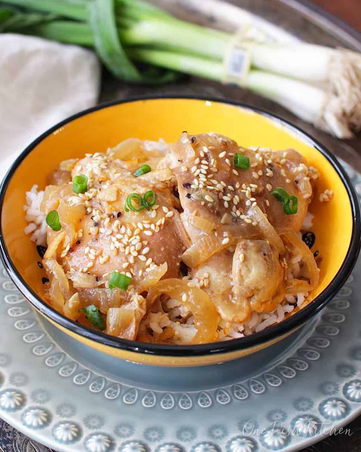 a bowl of orange chicken.
