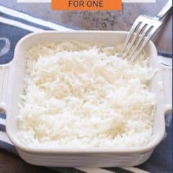 a small batch of cooked rice in a square baking dish.