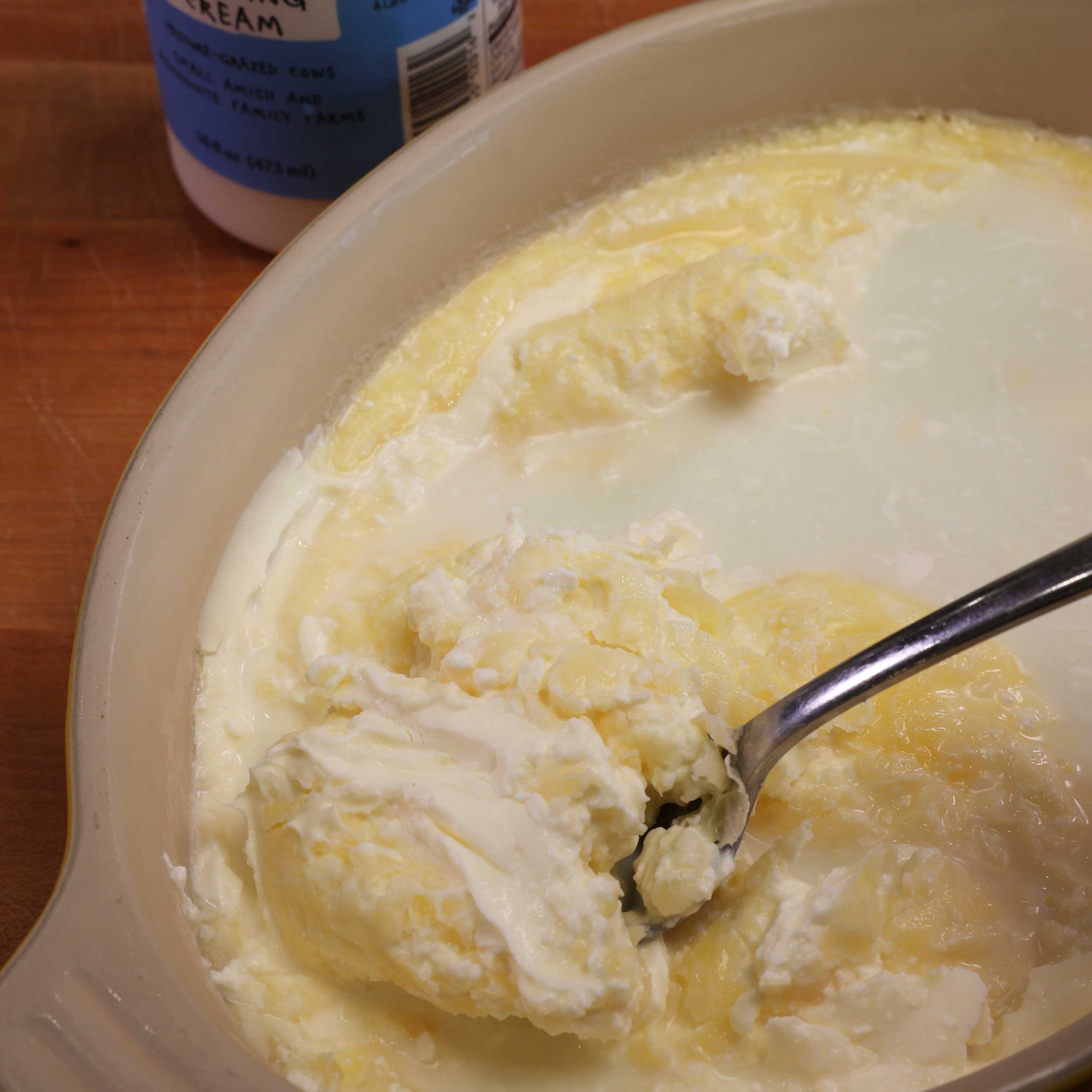 clotted cream in a yellow bowl.