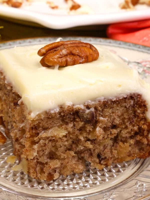 a slice of hummingbird cake on a plate.