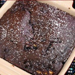 a small chocolate zucchini bread baked in a square baking dish