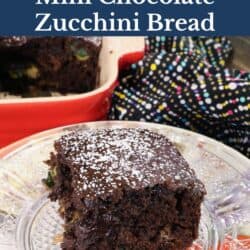 a slice of chocolate zucchini bread on a white plate.
