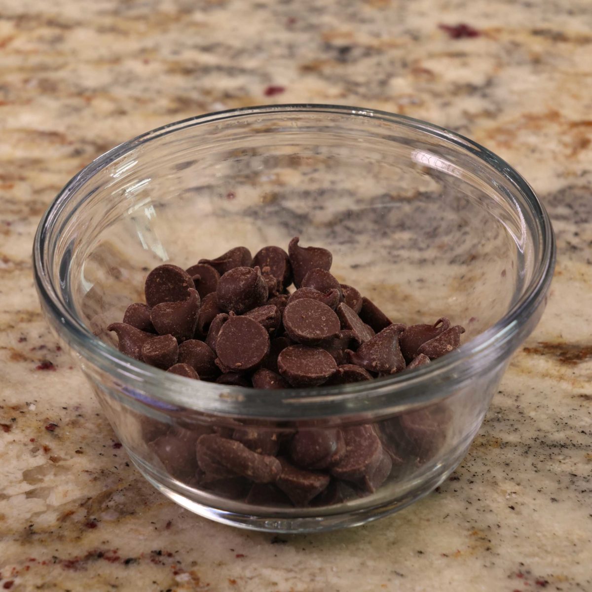 chocolate chips in a small clear bowl