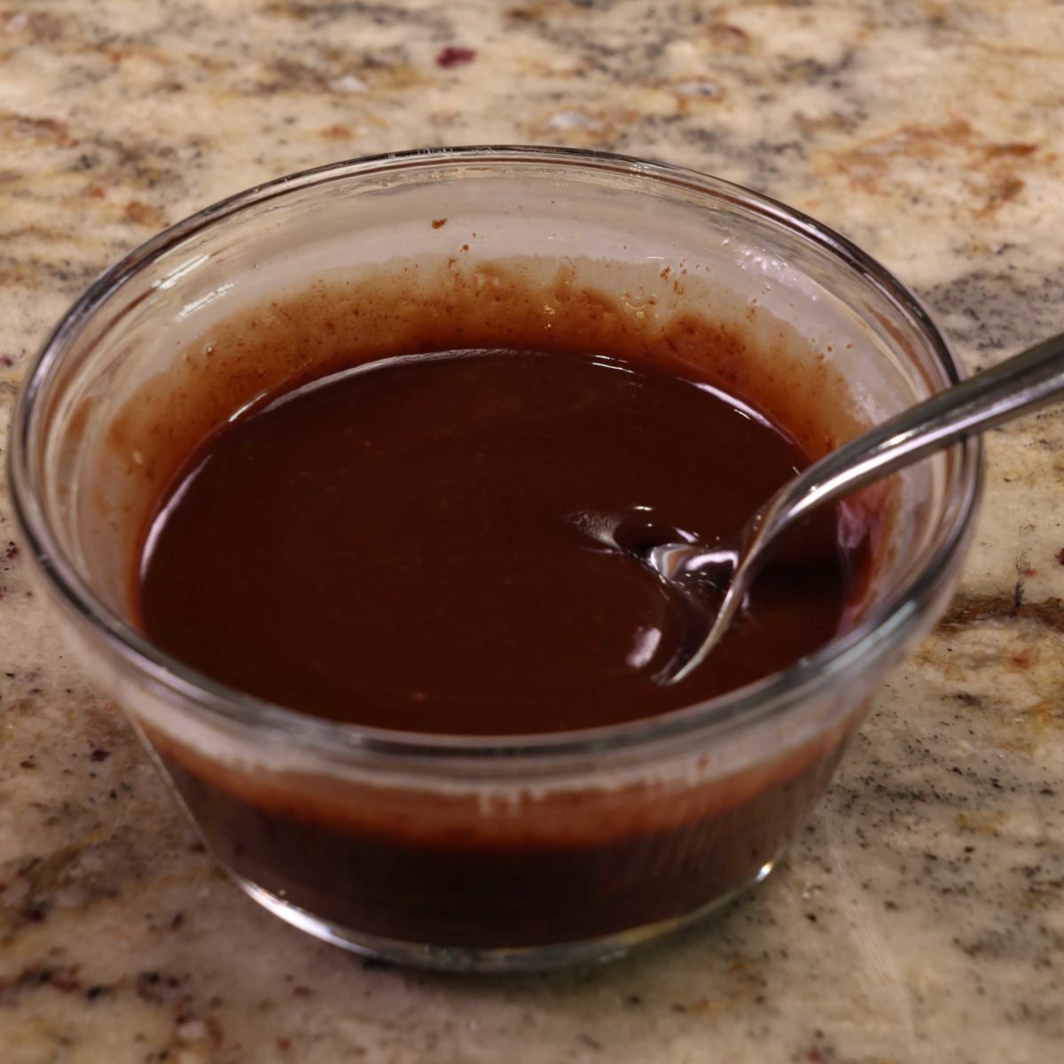 melted chocolate in a small glass bowl