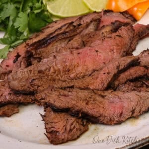 carne asada on a white plate.
