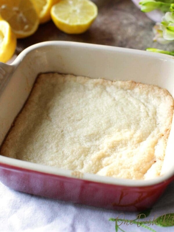 pie crust in a red baking dish
