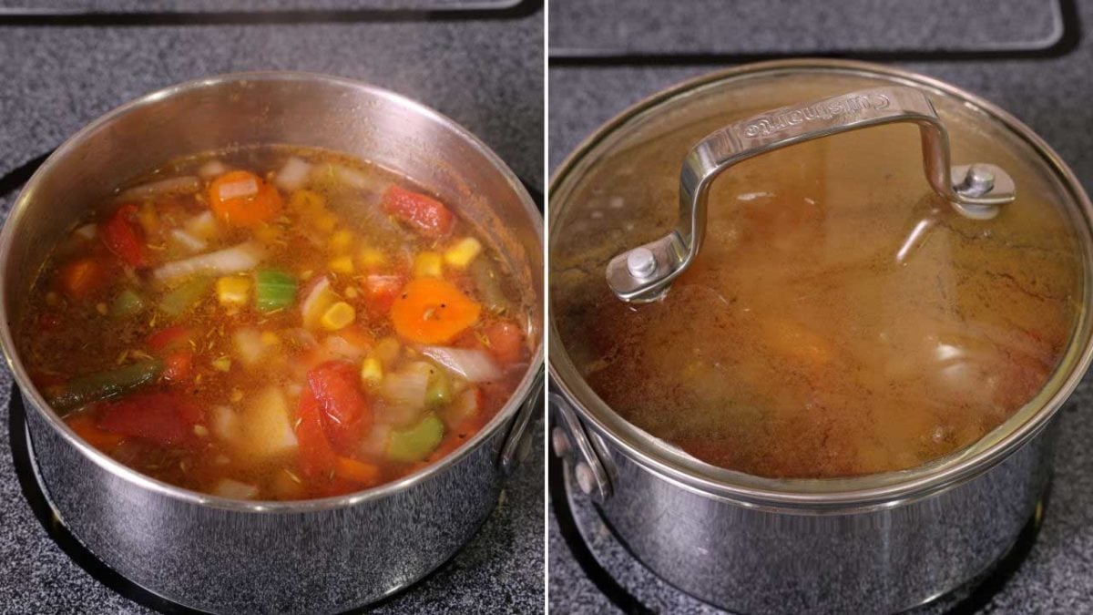 vegetable soup in a small pot on the stove.