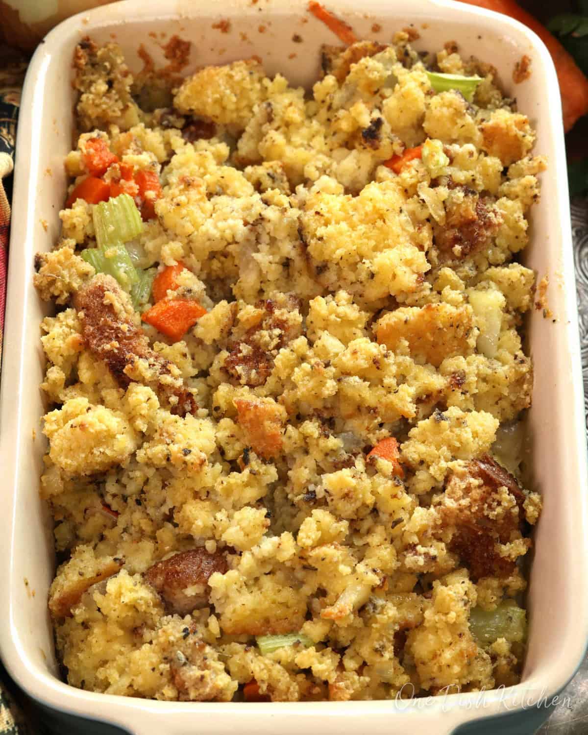 a small batch of homemade cornbread dressing in a baking dish.