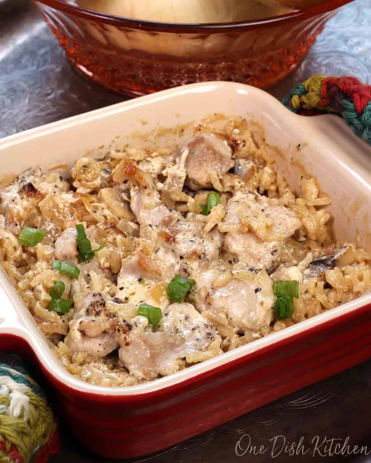 a single serving chicken and rice casserole in a small baking dish.