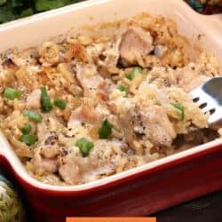 a small chicken and rice casserole with a fork on the side of the dish.